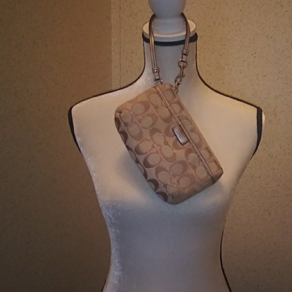 Coach Handbags - Coach Signature tan pink wristlet